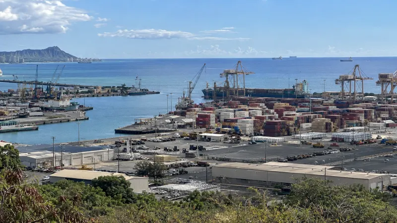 Cargo cranes and containers at Honolulu Harbor