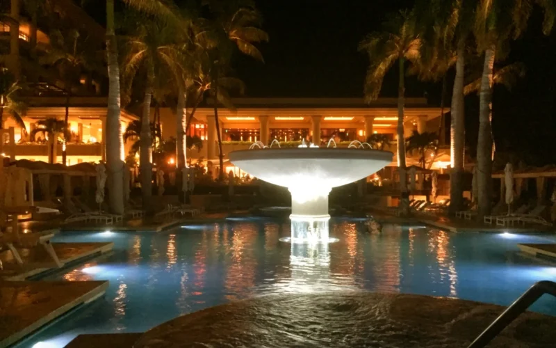 The lit lobby and pool fountain at Four Seasons Resort Maui at Wailea at night