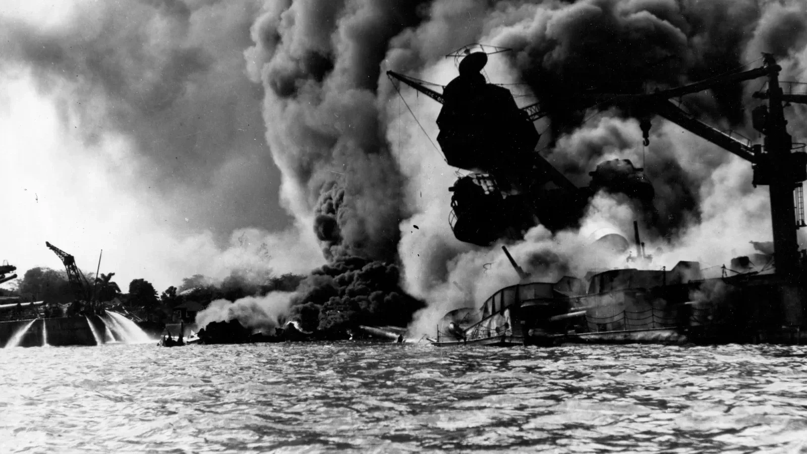 USS West Virginia and USS Tennessee burning at Pearl Harbor on Dec. 7, 1941