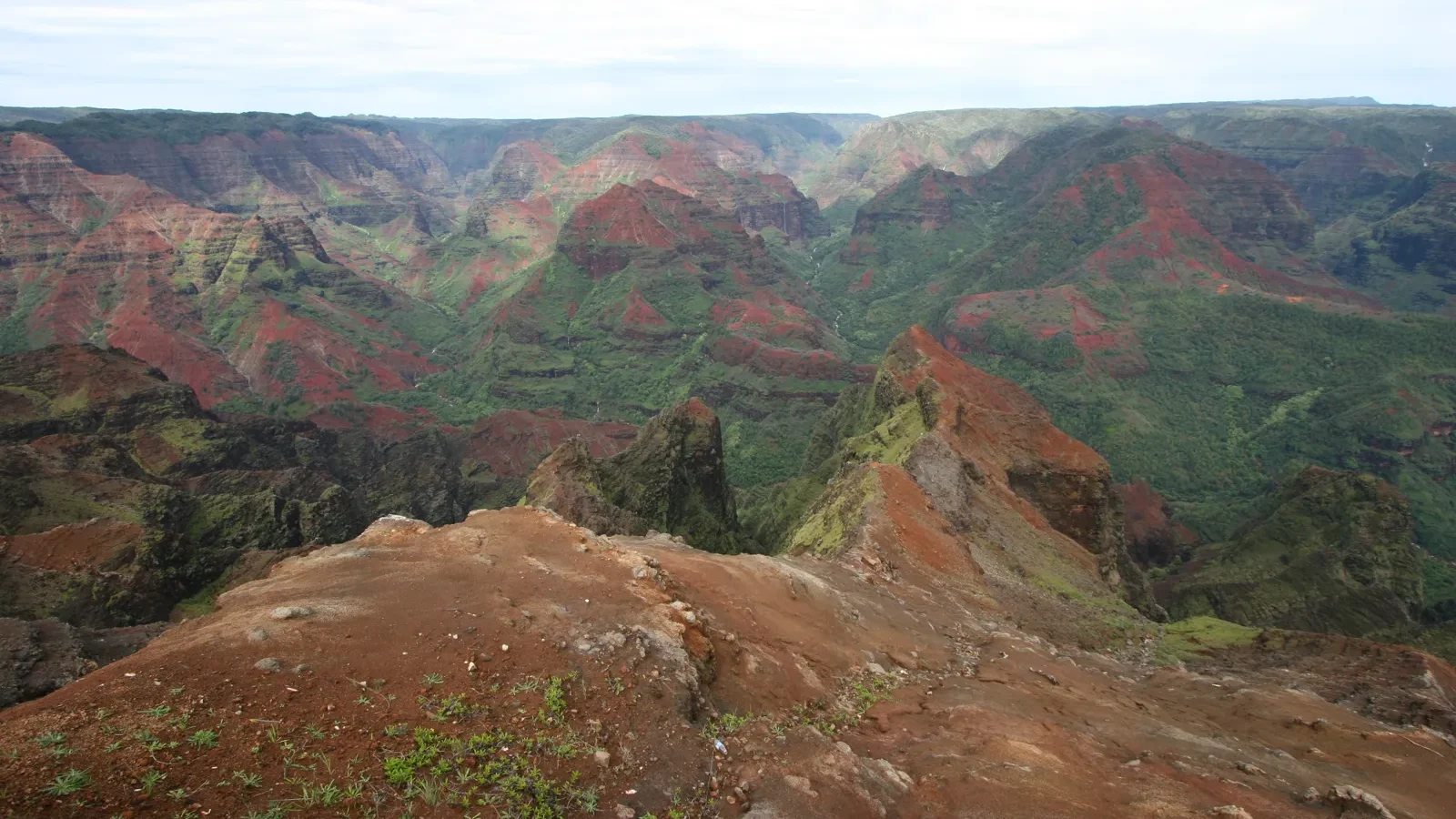 Red cliffs and ridges of Waimea Canyon on Kauaʻi